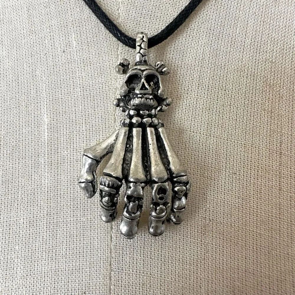 Skeleton claw silver tone pendant necklace